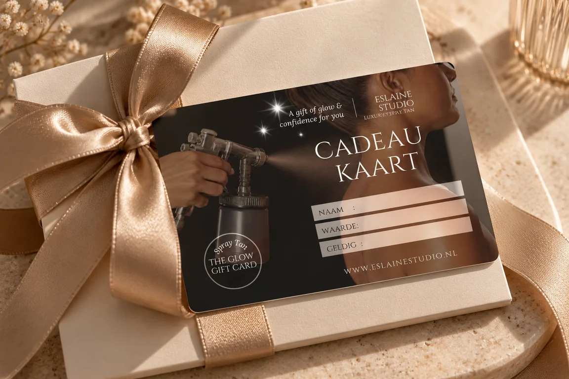 Cadeaubon van Studio Eslaine in een crèmekleurige geschenkdoos met gouden strik, klaar om cadeau te geven